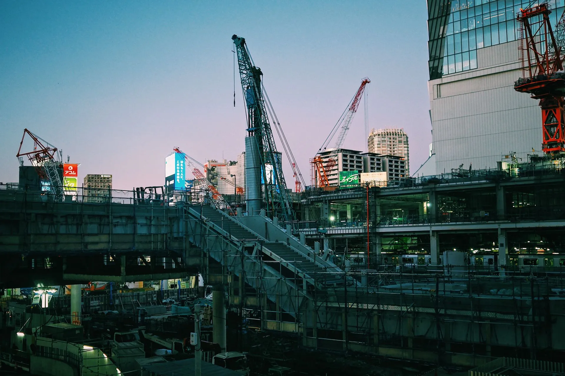 Construction site illuminated at dusk